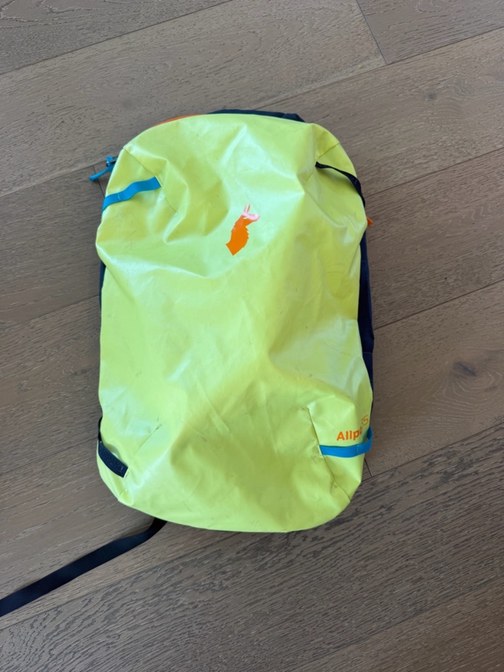 Cotopaxi 35 L travel pack Bright Yellow Outdoor Backpack with Orange Accent